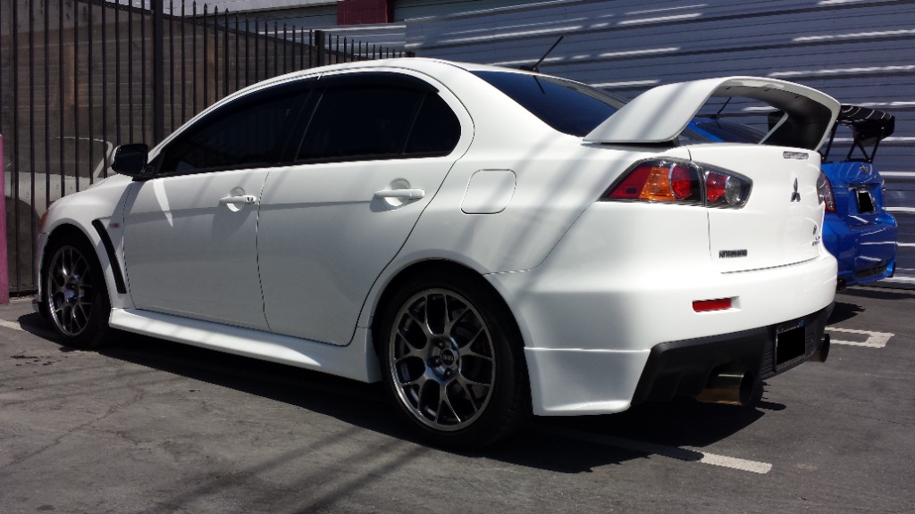 EVOLUTION X OEM STYLE REAR BUMPER EXTENSION COVER SPATS PAINTED W37