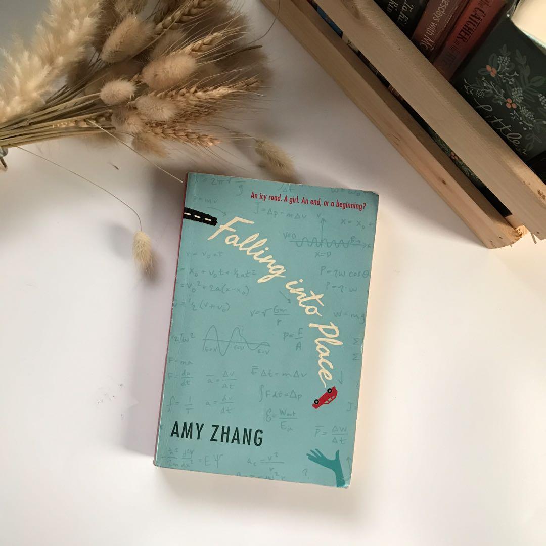 Falling Into Place by Amy Zhang (Category: Storybooks) located in Cavite. Submitted by hellocari (Listing ID 1036506342, Image 1). Description: In good condition. Yellowed pages but no tear or damage.