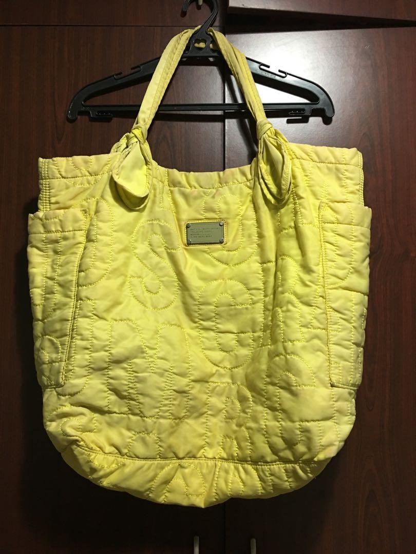 Marc Jacobs large nylon bag (Category: Luxury Bags & Wallets) located in Pasig City. Submitted by 53888 (Listing ID 1036586934, Image 1). Description: Selling low Authentic MJ nylon tote Measurement: L18” x H21” Flaw: fading color (visible on the photos).