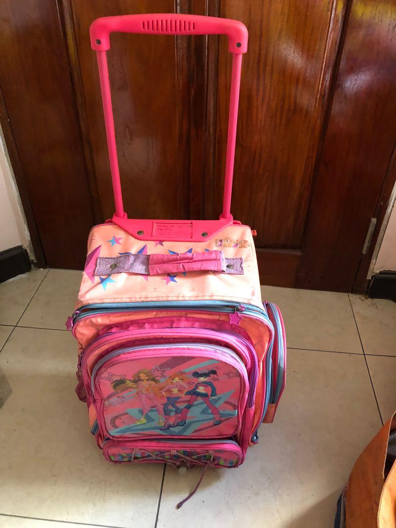 Winx club stroller school bag (Category: Strollers) located in Manila. Submitted by bondea (Listing ID 1036463689, Image 2). Description: Defective zipper Side pocket with hole.