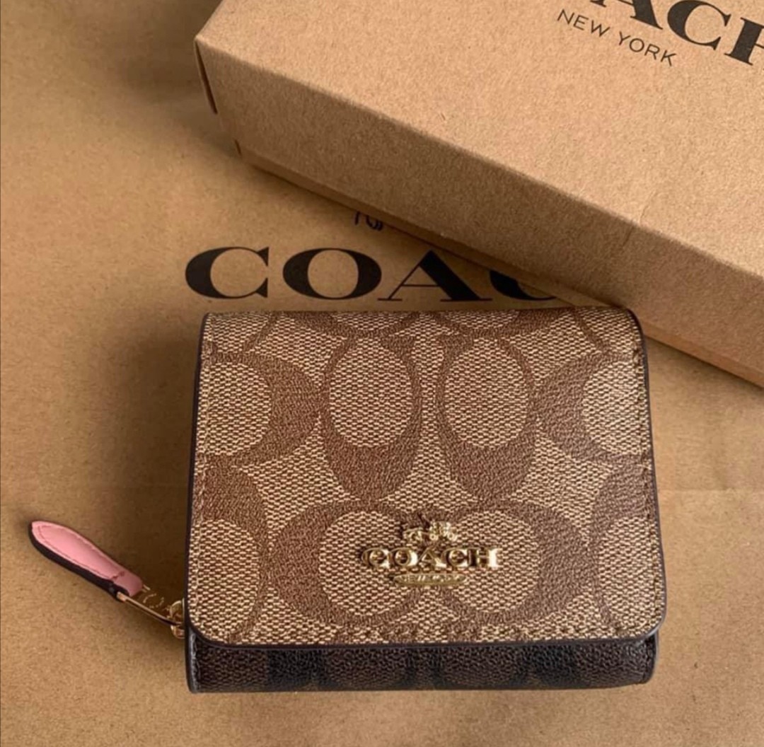 coach small trifold wallet in signature canvas