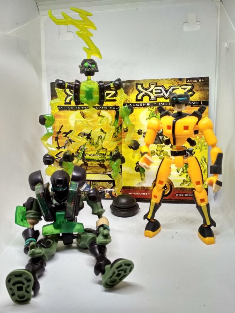 Xevoz Hasbro Toy Figures Set (Category: Action & Battle Toys) located in Bacoor. Submitted by collectors_haul (Listing ID 1036773099, Image 1). Description: Authentic Hasbro figures with highly posable and interchangeable parts. Comes with instruction booklet for Shock Berserker and a Battle Terrain Game Rules Booklet. Pre-owned. Some joints already loose in their brand new state. Tallest is Shock Berserker which measures 8.5 inches tall. Slightl