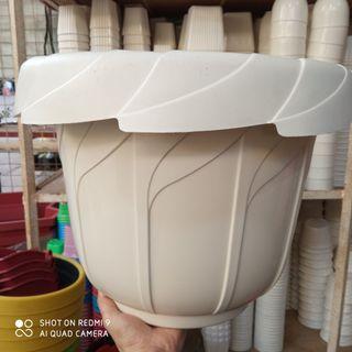 Big white plastic pot