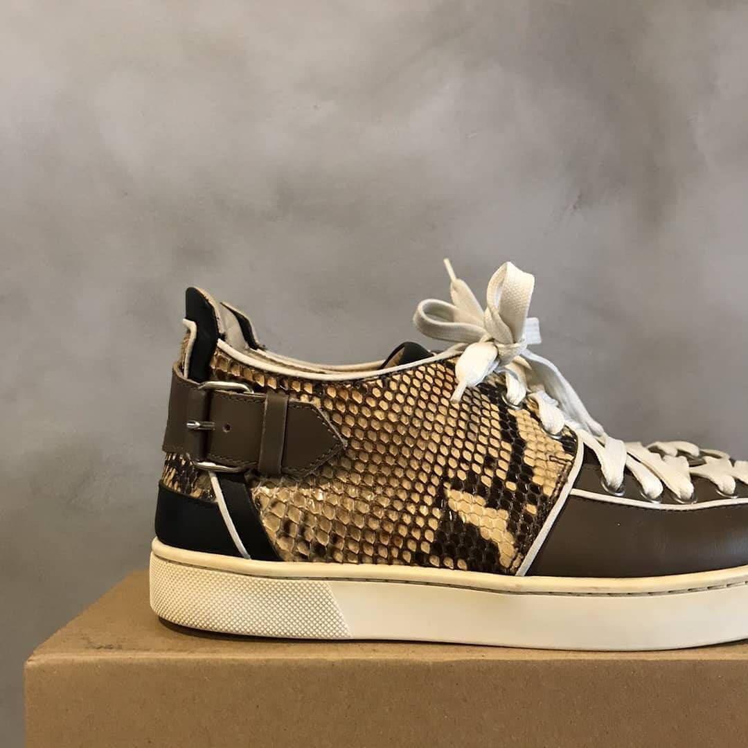 Louboutin snake sneakers store