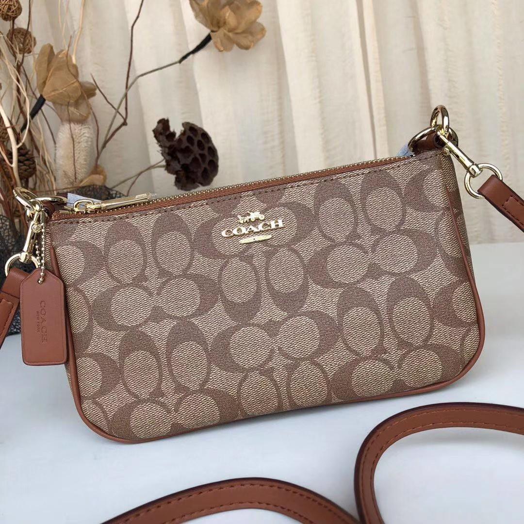 Coach ladies sling bag on sale