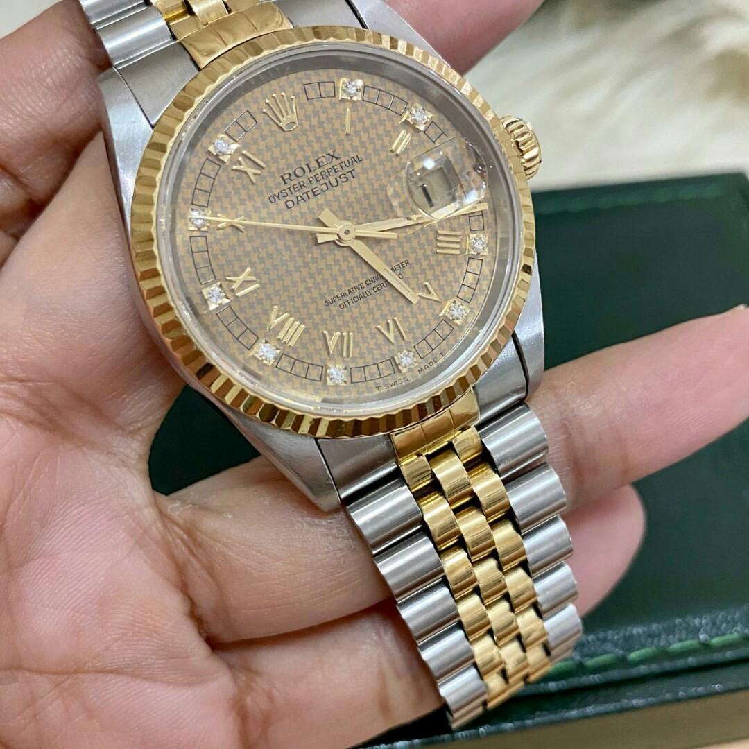 ROLEX DATEJUST OYSTER PERPETUAL TWO TONE 18k YGOLD/SS MENS SIZE GOLD ROMAN  DIAL W/DIAMONDS, Luxury, Watches on Carousell