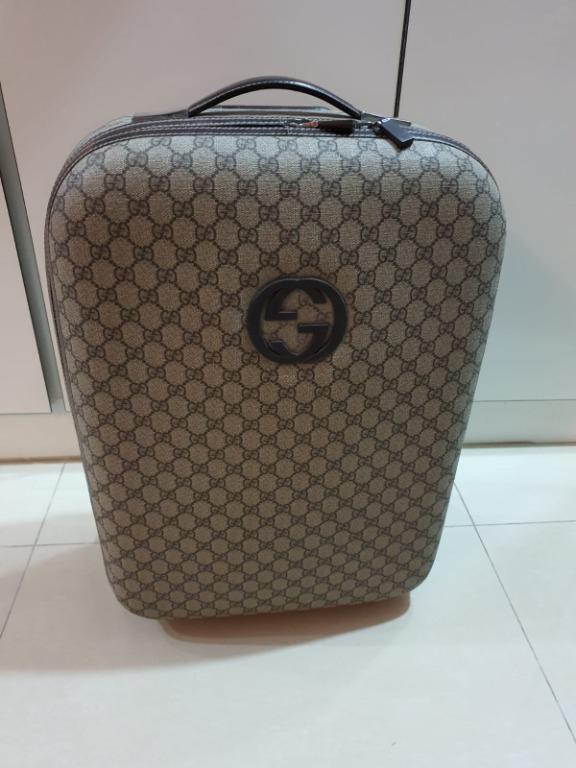 gucci luggage bag