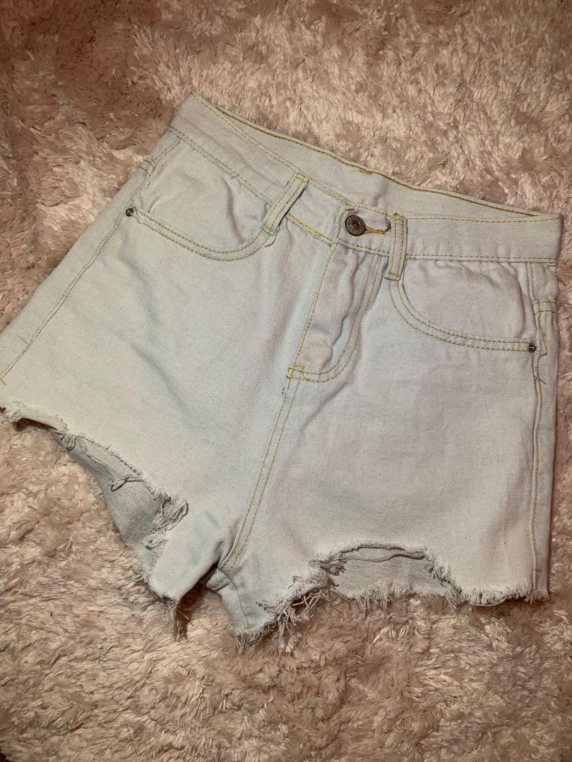 High waist shorts (Category: Shorts) located in Manila. Submitted by bchrssm (Listing ID 1037295176, Image 1). Description: Tattered cut Size 25 on measuring tape.