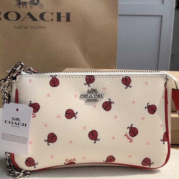 coach metallic berry wallet