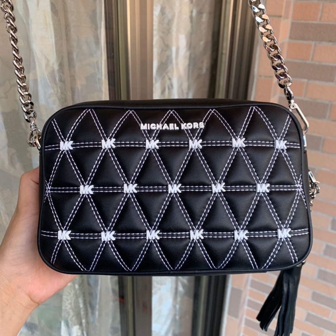 ginny medium quilted leather crossbody bag