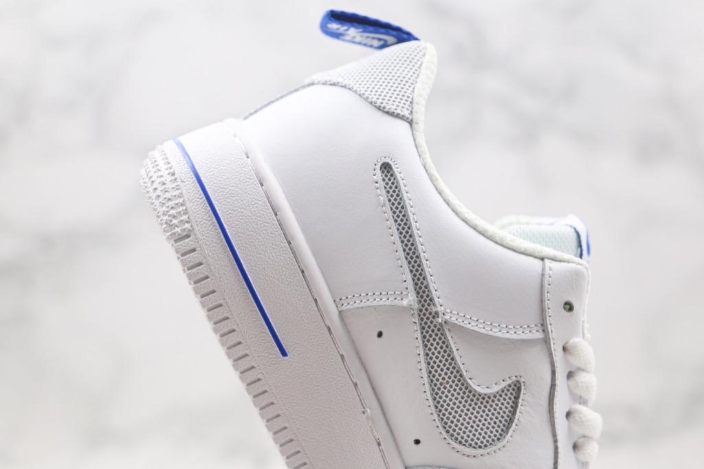 Air force 1 discount white with blue swoosh