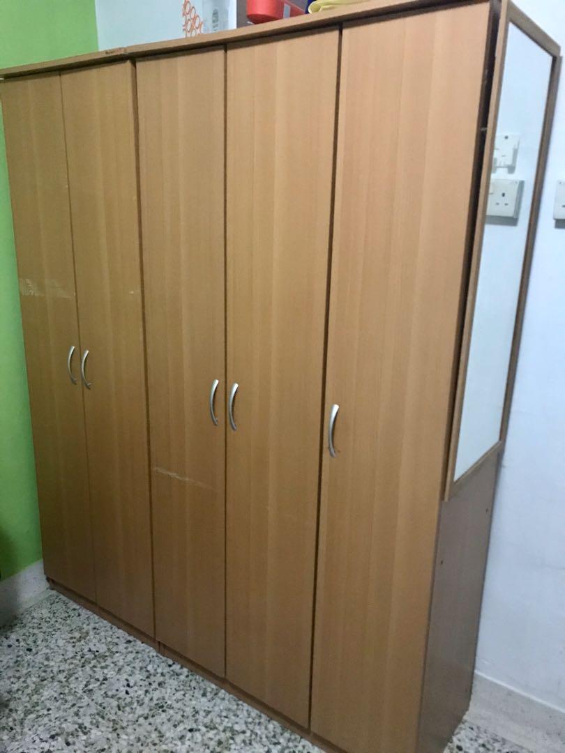 Mirror on top side of wardrobe