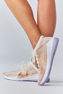 nike training air zoom fearless sneakers in rose gold