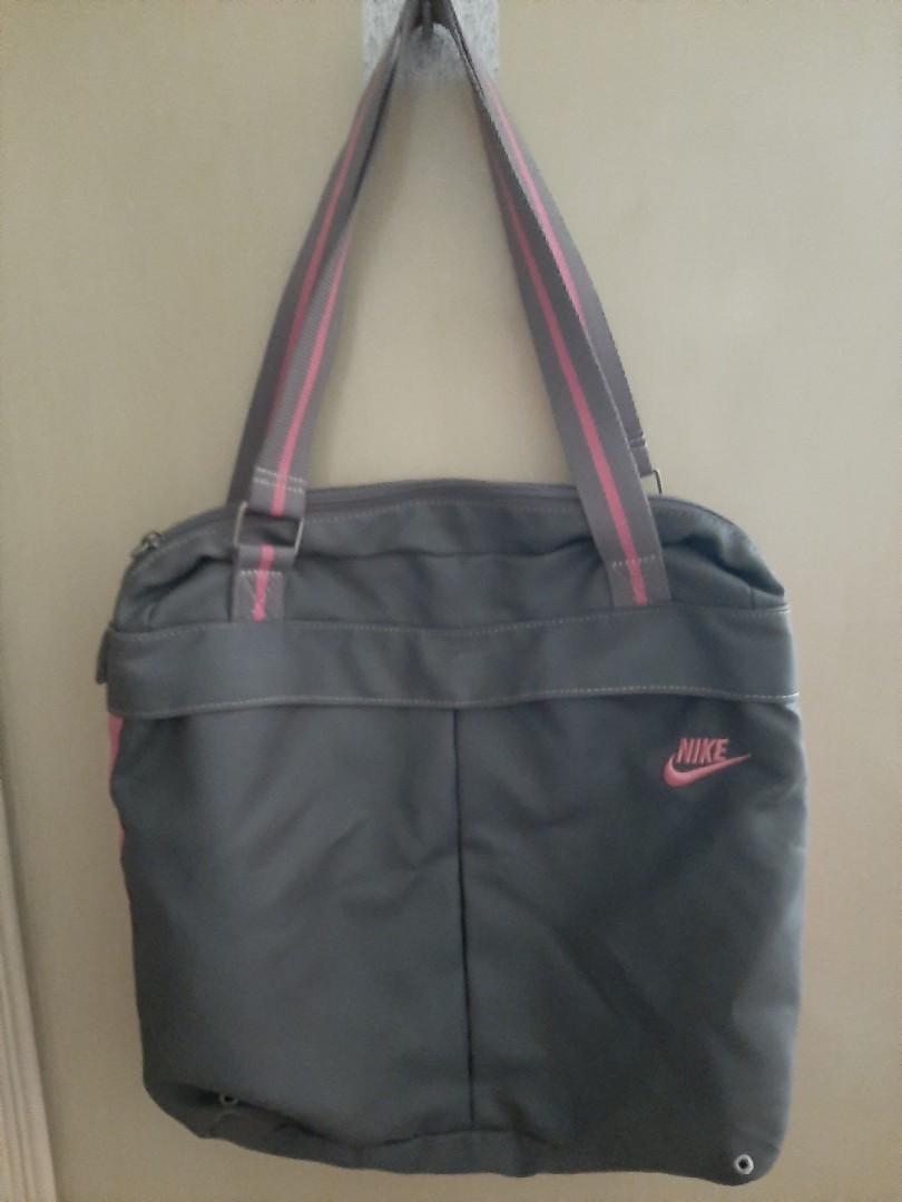 Nike Sports bag (Category: Cross-body Bags) located in Quezon City. Submitted by archer417 (Listing ID 1037641212, Image 2). Description: pre loved nike sports/gym bag pm for more pics.