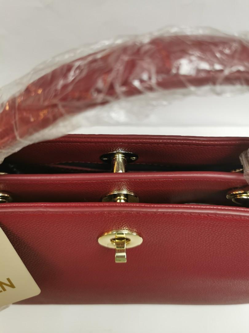 CLN structured bag (maroon red) (Category: Tote Bags) located in Malabon City. Submitted by esg63 (Listing ID 1037996037, Image 2). Description: brand new CLN bag - push lock closure - 2 separate space - 2 type handle ( have extra strap) no any damage - kept an never been use (declutter).