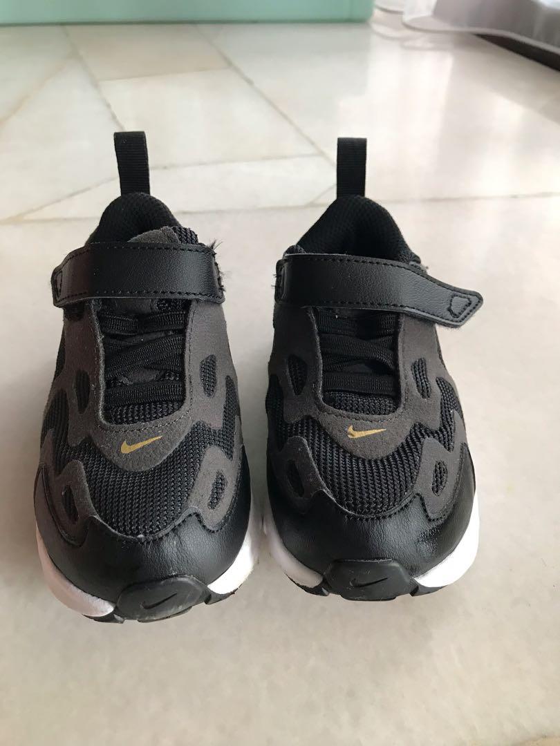 boys black and gold nike