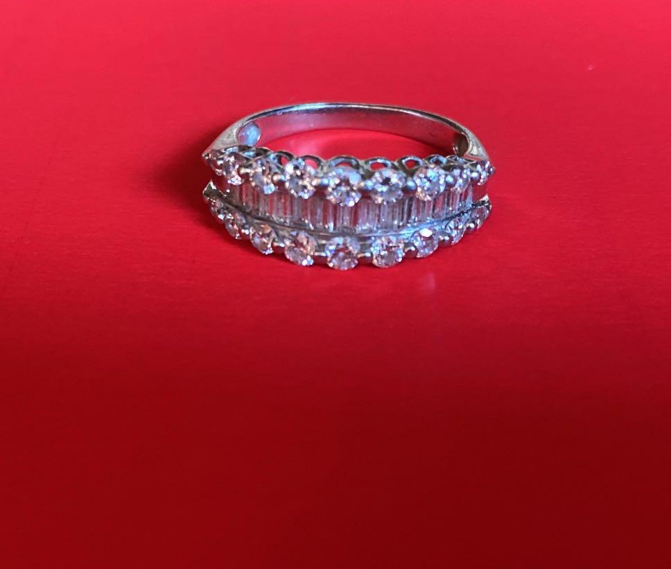 Platinum Diamond Ring (1.5 karat diamond total) (Category: Rings) located in Bacolod City. Submitted by blackwidow28 (Listing ID 1037833853, Image 2). Description: Selling my Personal Ring in size 6 1/2...its a Platinum Diamond Ring(pt900) and has a total of 1.50 karat diamonds..this is one of a kind ring,a lot copied it but this one is rare coz its in Platinum,Platinum is much stronger and durable kind of metal... #price is Fixed# .