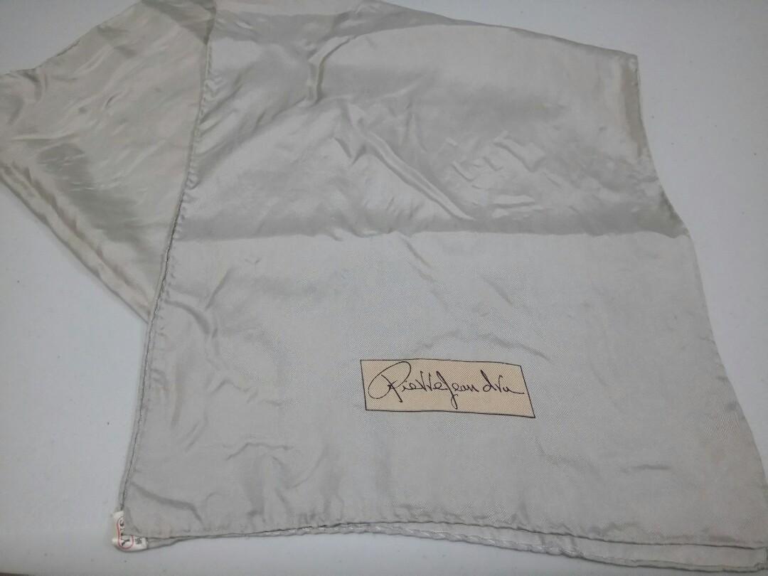 Thin Beige Silk Scarf (Category: Scarves) located in Manila. Submitted by ameri8 (Listing ID 1037941171, Image 1). Description: Size: 11 x 51 inches Material: Silk Flaws: Faint yellow spots in a number of places due to storage (these are hard to capture using my camera but I tried to show them in the 3rd picture) Condition: Good with signs of long storage. This can be used as a hair band or can be tied to your bag..
