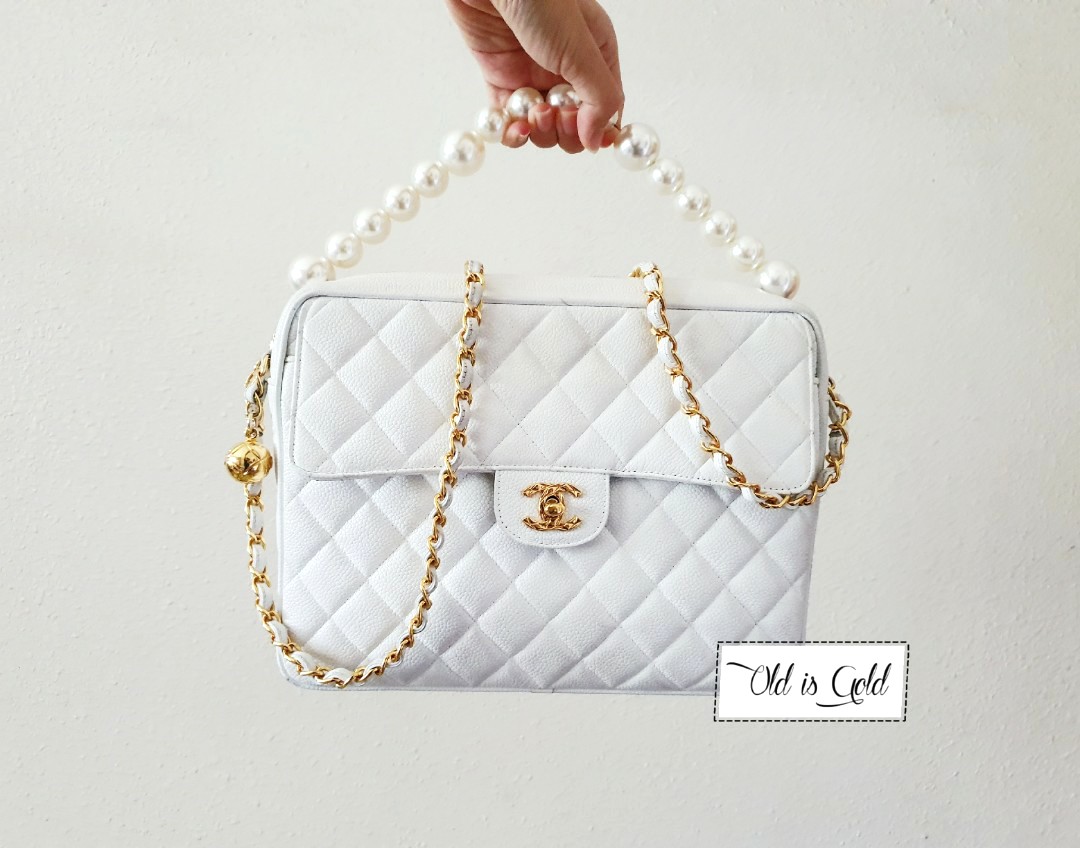 Chanel Pink Tweed Flap Bag With Large Pearl Handle  SS19 Collection at  1stDibs  chanel tweed pearl bag chanel pearl handle bag chanel tweed bag  with pearls