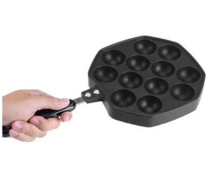 Japanese Takoyaki Pan (Category: Cookware & Accessories) located in Manila. Submitted by trustradeglobal (Listing ID 1038054851, Image 3). Description: This high quality single handled cast iron pan is designed for Takoyaki, the beloved Japanese street good. As you would want from a takoyaki pan, this Cast Iron Pan has a non-stick surface. The batter does not stick at all. You will be able to esily remove the takoyaki out of it. • The pan heat up