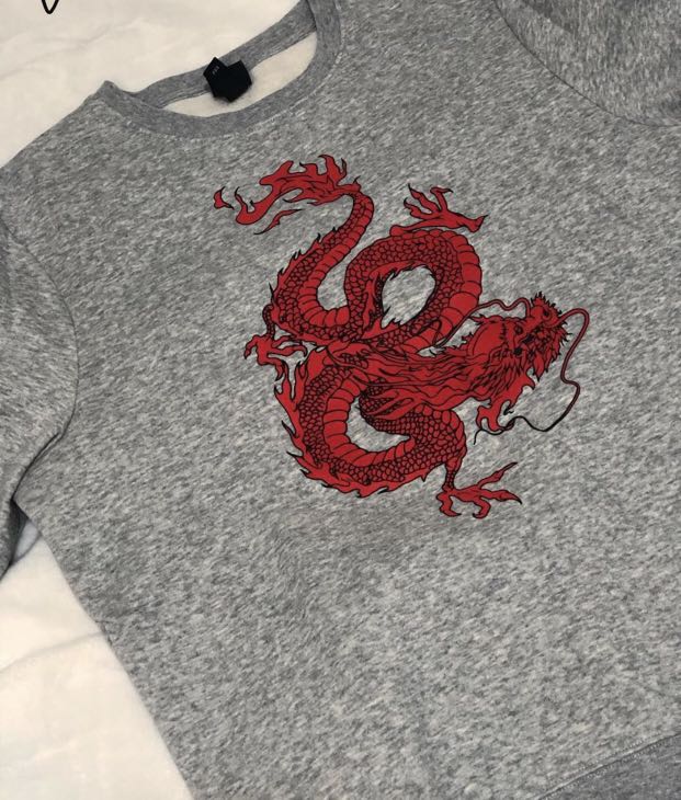 red and gray sweater