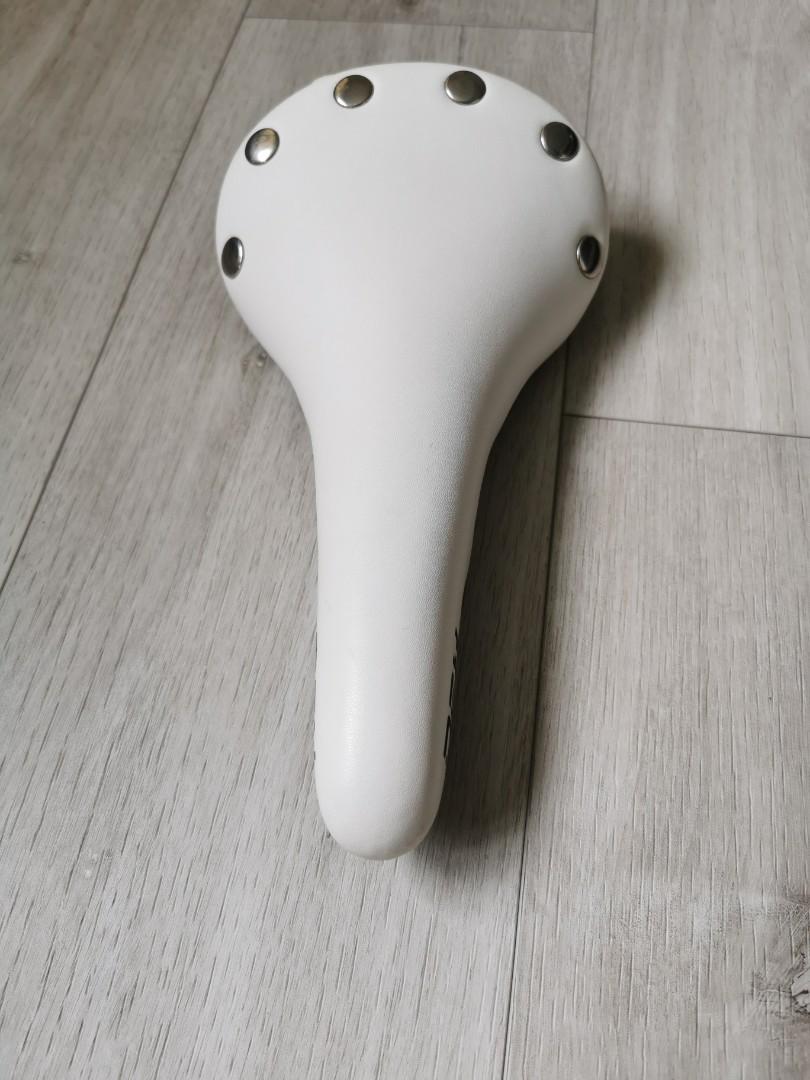 white bicycle saddle