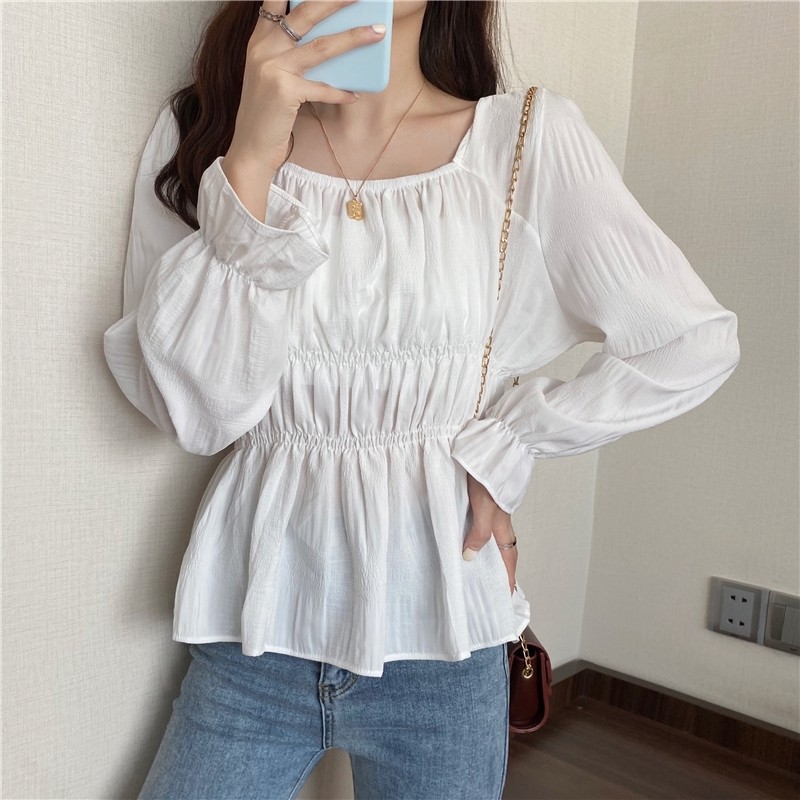 red blouse with ruffle sleeves