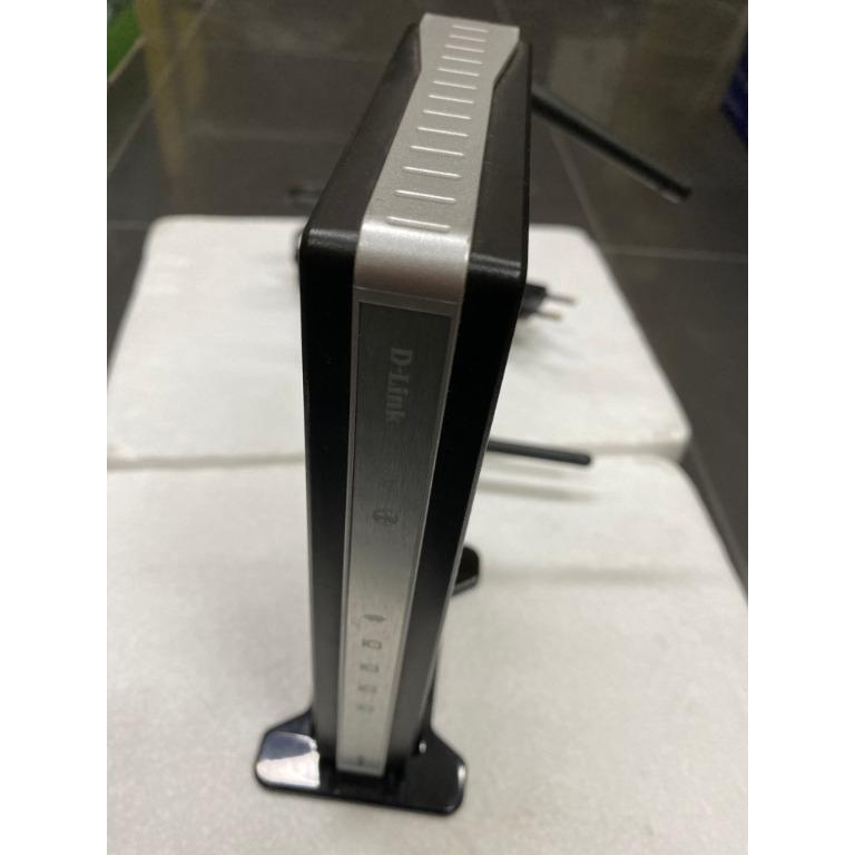 Dlink DIR 615 router (Category: Networking) located in Valenzuela. Submitted by cletini (Listing ID 1038286011, Image 2). Description: Used but in good condition. No box but with adaptor and stand. .