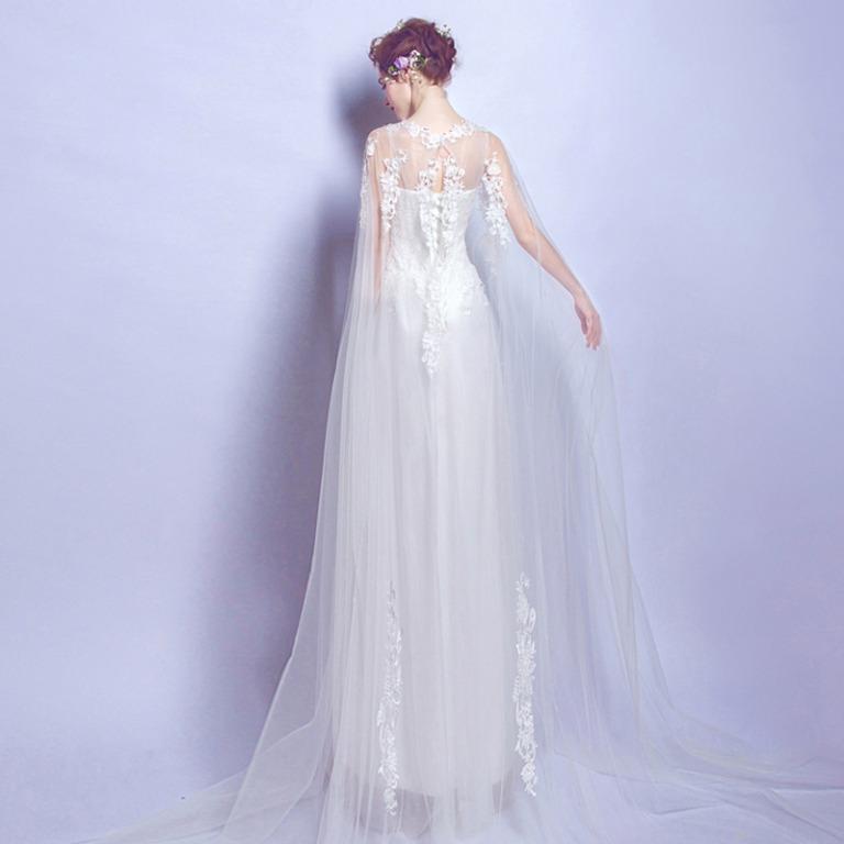 White cape sales wedding dress