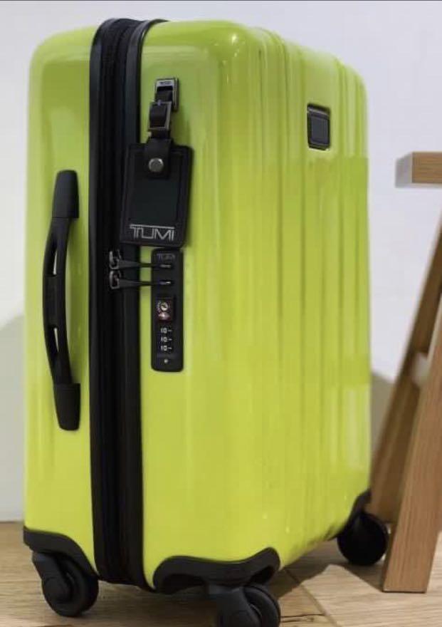 Tumi yellow store luggage