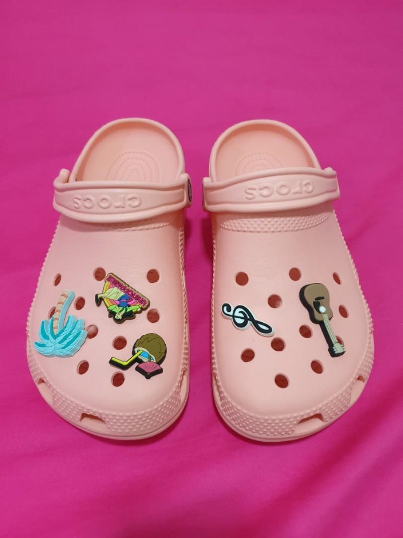 pink crocs with charms