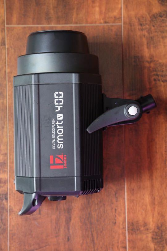 JinBei Smart V 400 Studio Flash (Category: Lighting & Studio Equipment) located in Singapore. Submitted by coldfish (Listing ID 1038632856, Image 1). Description: Very powerful studio flash in perfect working condition. Add $100 to get a sturdy boom worth $300..