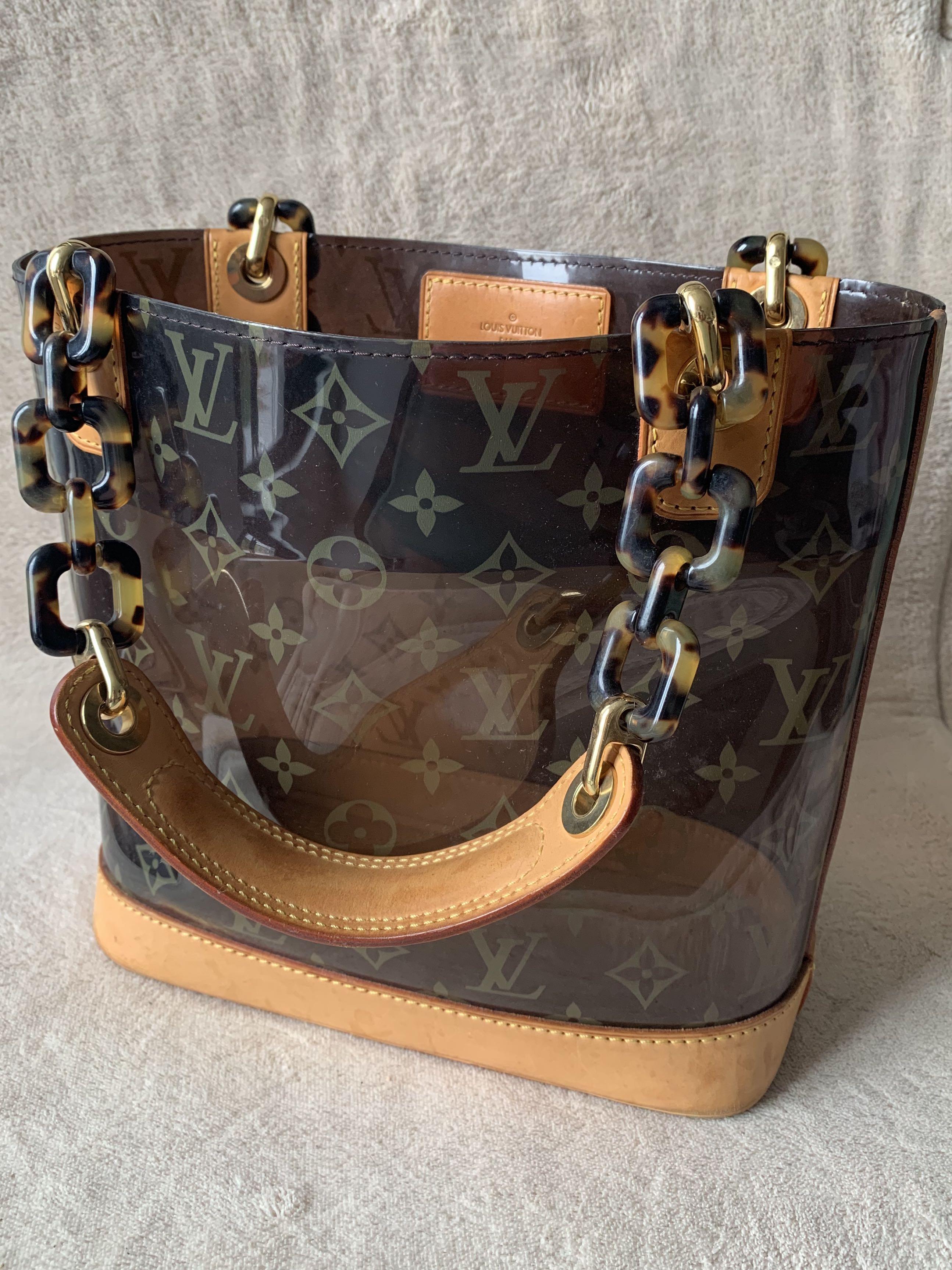 Louis Vuitton monogram clear Vinyl Cabas Ambre tote bag, Luxury, Bags &  Wallets on Carousell