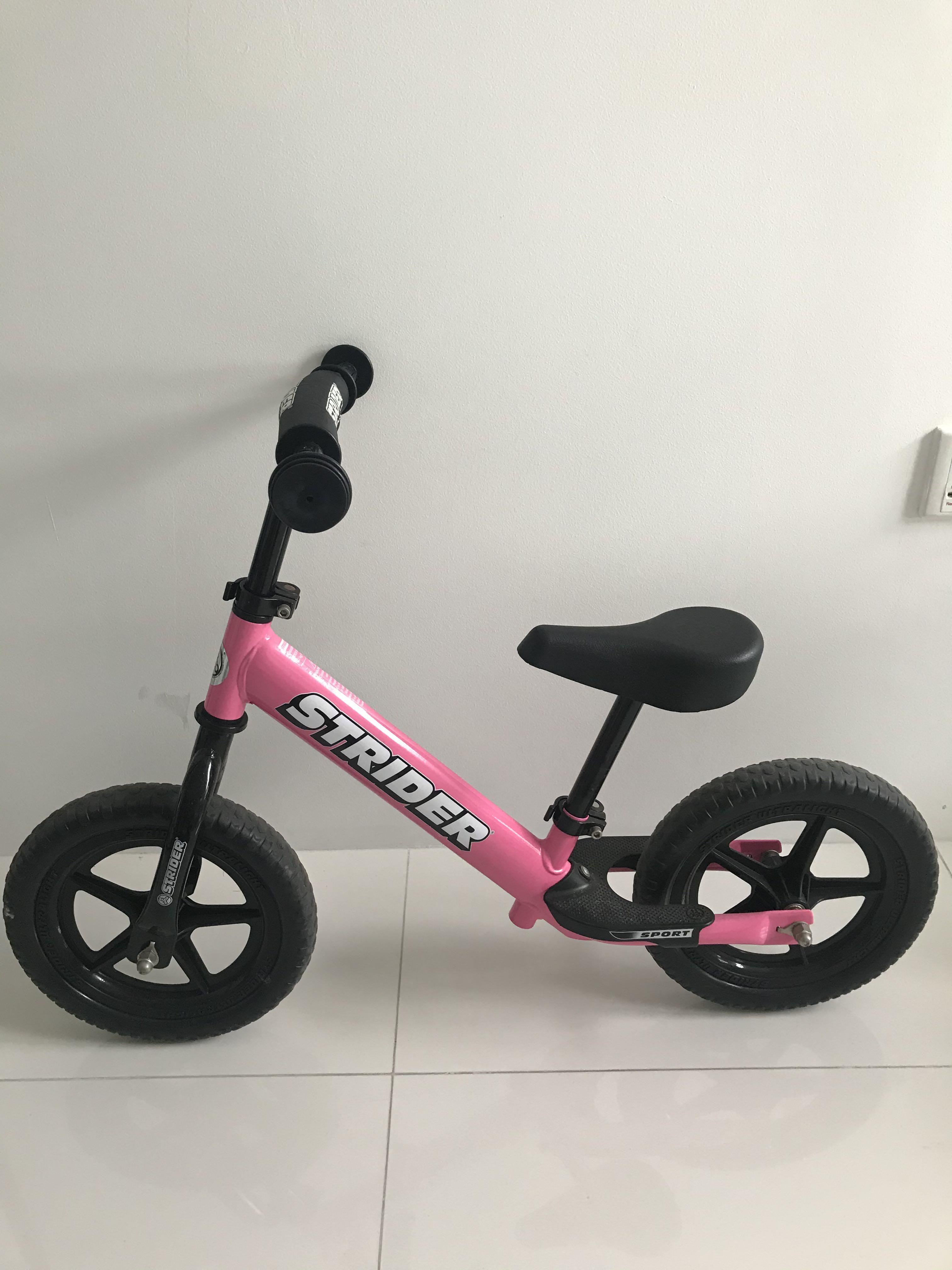 strider balance bike pink