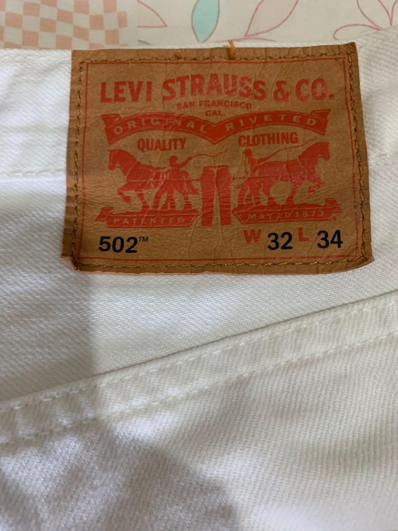 Levi's 502 white jeans for sale. Wore less than 5 times. As good as new.,  Men's Fashion, Bottoms, Jeans on Carousell
