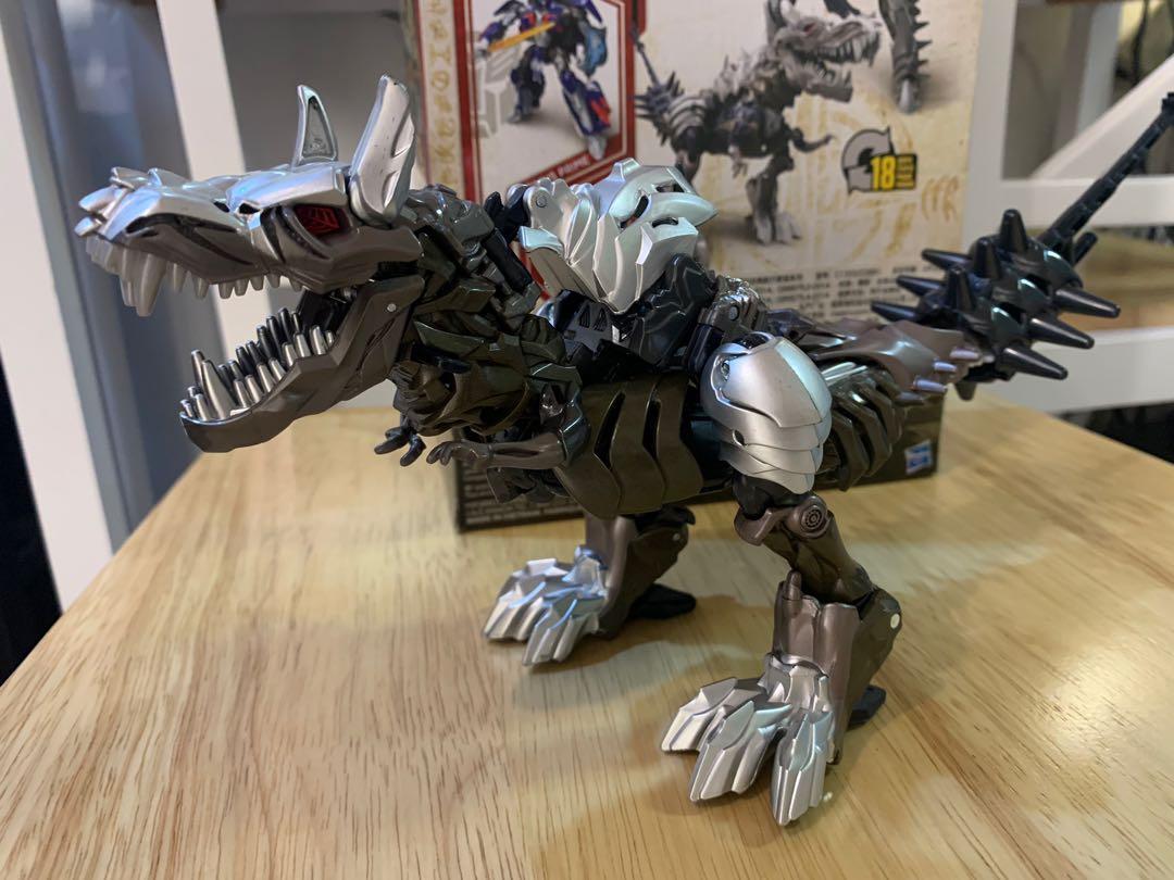 GRIMLOCK ( Transformers MOVIE4 ) voyager (Category: Action & Battle Toys) located in Quezon City. Submitted by transformworld28 (Listing ID 1033570855, Image 1). Description: Authentic HASBRO GRIMLOCK TRANSFORMERS MOVIE 4 Voyager size Almost 10inches tall Collectible Bnew sealed ( sample actual picture attached ) QC free delivery Contact no 09209560528.