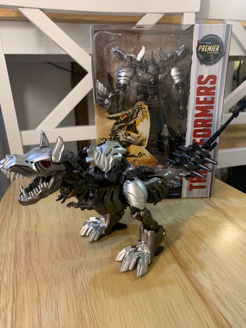 GRIMLOCK ( Transformers MOVIE4 ) voyager (Category: Action & Battle Toys) located in Quezon City. Submitted by transformworld28 (Listing ID 1033570855, Image 3). Description: Authentic HASBRO GRIMLOCK TRANSFORMERS MOVIE 4 Voyager size Almost 10inches tall Collectible Bnew sealed ( sample actual picture attached ) QC free delivery Contact no 09209560528.
