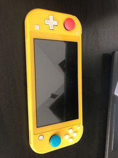 Nintendo switch lite and animal crossing game card