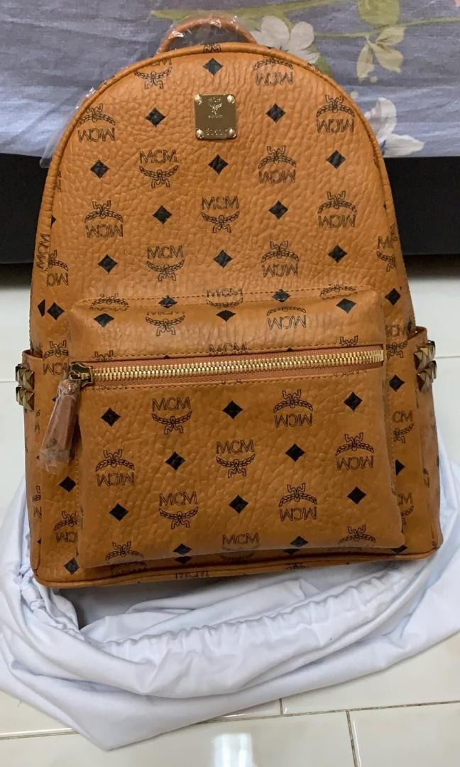 Authentic MCM Backpack ( Look at the receipt and if its fake i will hold  full legal resonsibilty )