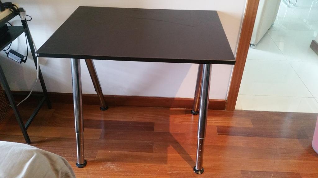 Study Desk (Category: Tables & Sets) located in Singapore. Submitted by jaccly (Listing ID 1033648043, Image 1). Description: You can mount the tabletop at a height that suits you since the legs are adjustable between 60-90 cm. 80x60 cm.