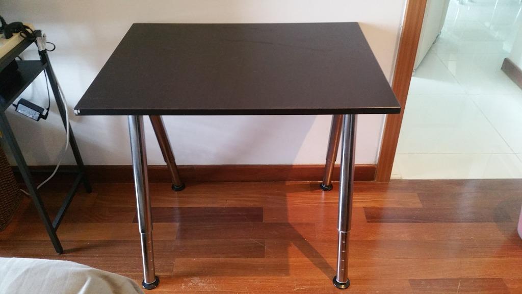 Study Desk (Category: Tables & Sets) located in Singapore. Submitted by jaccly (Listing ID 1033648043, Image 2). Description: You can mount the tabletop at a height that suits you since the legs are adjustable between 60-90 cm. 80x60 cm.