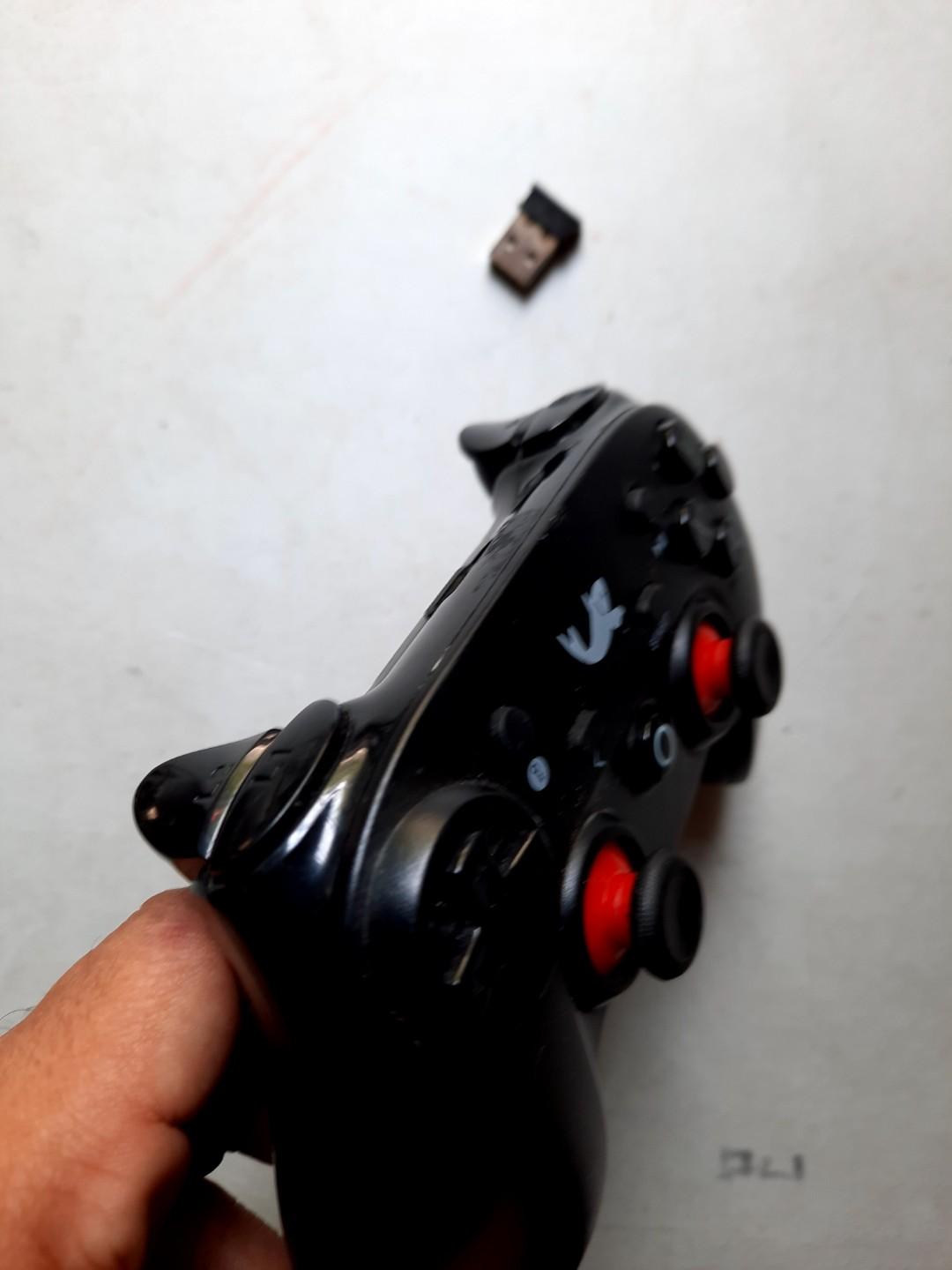 2.4ghz wireless game controller with dongle for pc or android box used (Category: Controllers) located in Las Pinas. Submitted by starpewpew (Listing ID 1033842375, Image 2). Description: Used 2.4ghz wireless game controller with dongle Can be used on pc and adroid box Can also be used thru usb cable 100% working 95% presentable With led status Rfs : selling excess hobby items Item in molino Can transact thru lalamove purchase service Can transac