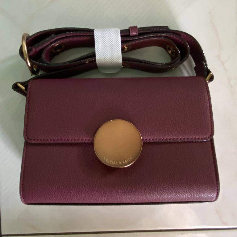 charles & keith circular buckle crossbody