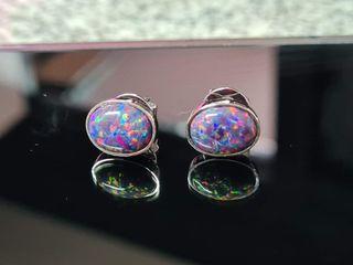 black opal earrings set in 14k white gold
