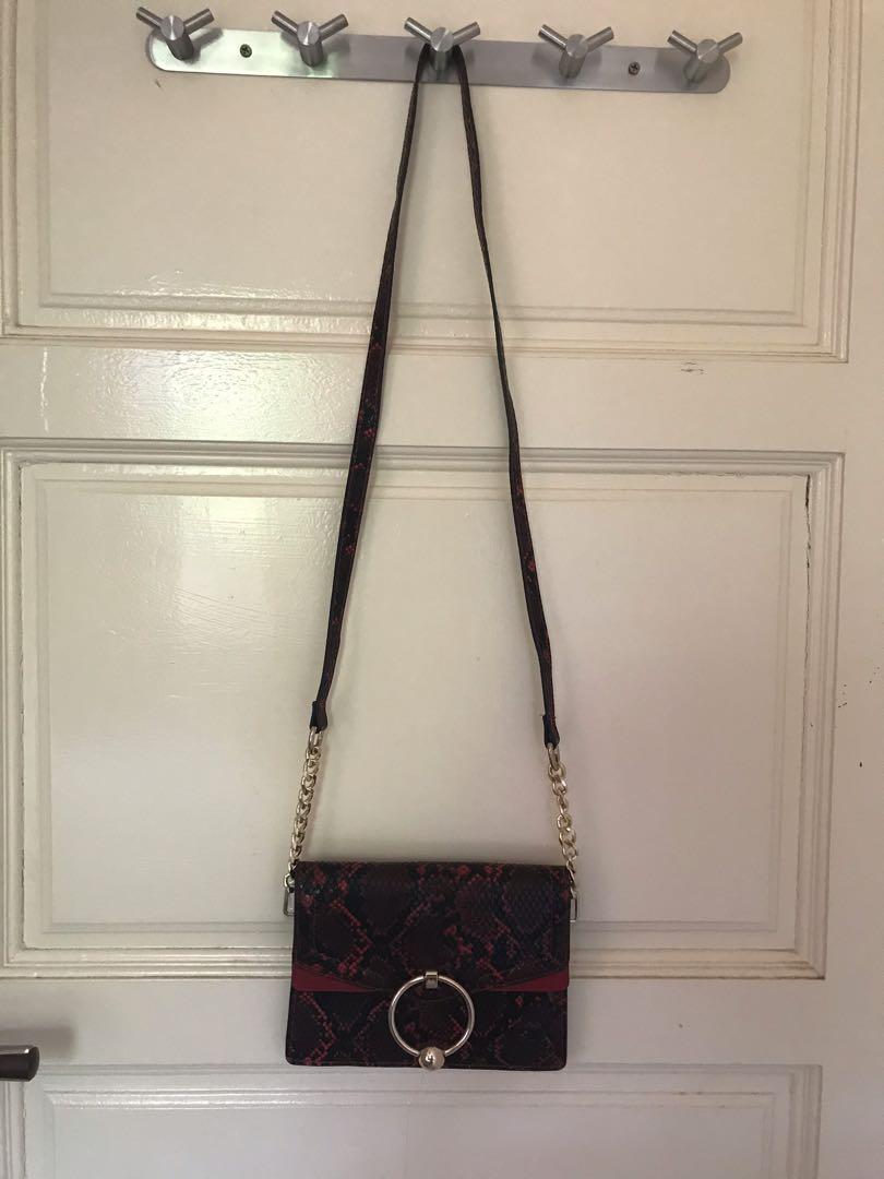 snake print sling bag