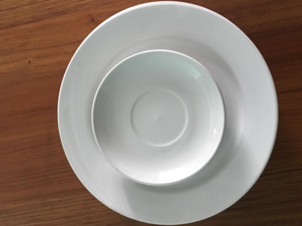 11 plain white ceramic plates normal sized + 2 small sized , slightly ...