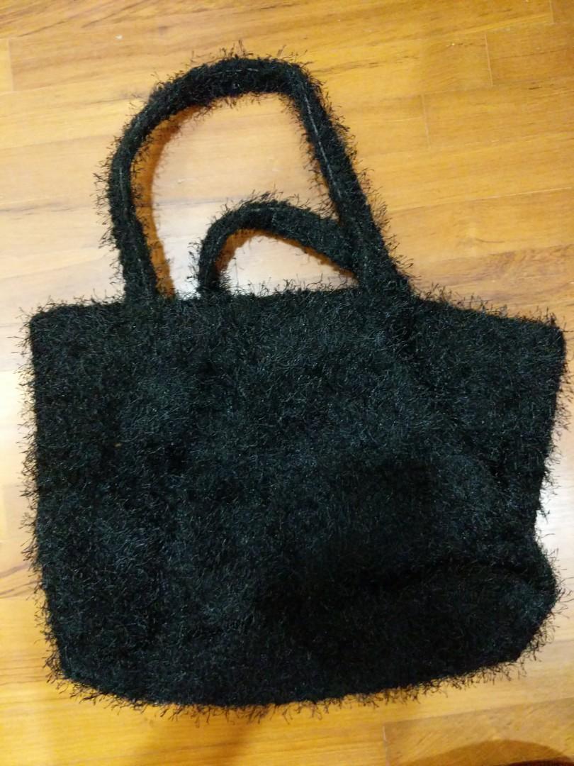 black fabric handbags
