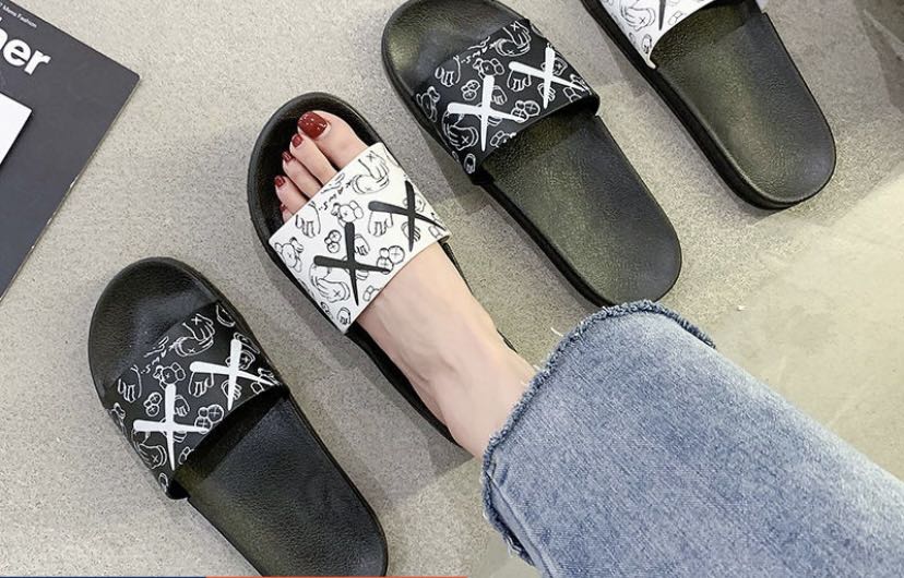 kaws flip flops