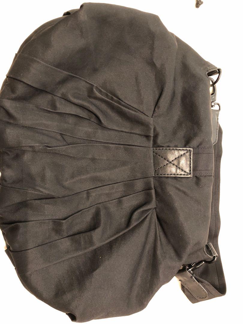 Yohji Yamamoto Bag (Category: Cross-body Bags) located in Singapore. Submitted by glamourgal (Listing ID 1059923256, Image 3). Description: Excellent for casual edgy wear and easy travelling (lightweight). Minor wear and tear at flap. Otherwise bag in perfect condition - zips and clips..