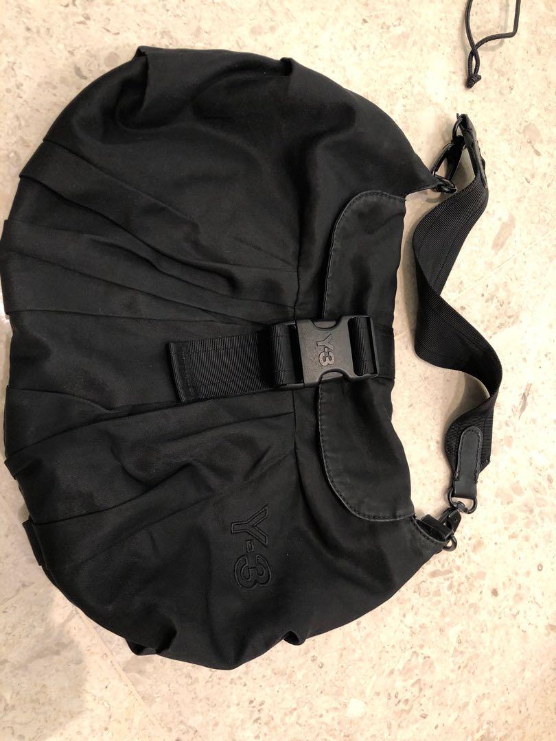 Yohji Yamamoto Bag (Category: Cross-body Bags) located in Singapore. Submitted by glamourgal (Listing ID 1059923256, Image 1). Description: Excellent for casual edgy wear and easy travelling (lightweight). Minor wear and tear at flap. Otherwise bag in perfect condition - zips and clips..